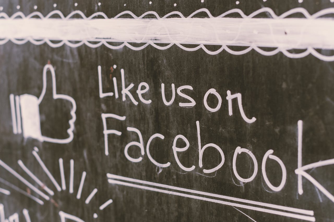 why-choose-us Chalkboard art promoting Facebook engagement with a like us message.